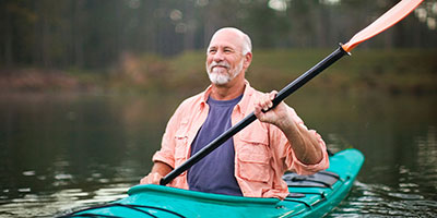 middle-aged man kayaking