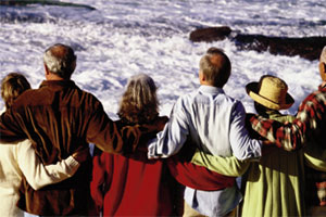 Image of couples walking on the beach