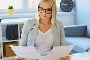 Woman looking at papers