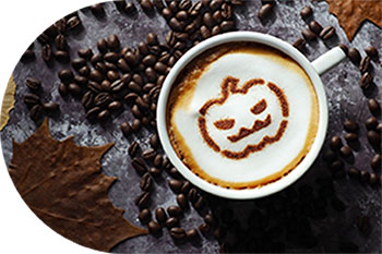 photo of coffee with a pumpkin drawn in the foam
