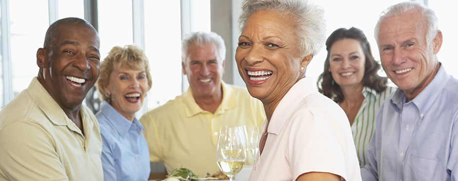 Group of older friends at a table