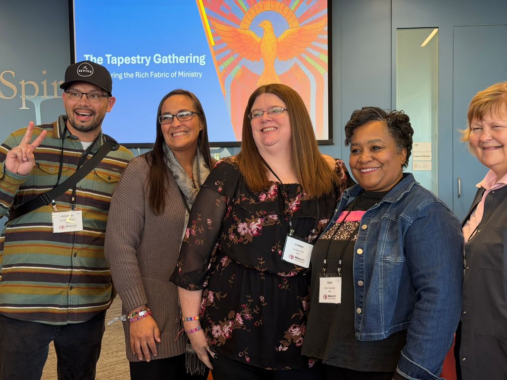 Attendees smiling for a final photo