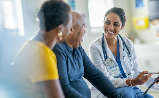Doctor Talking with a Senior Couple